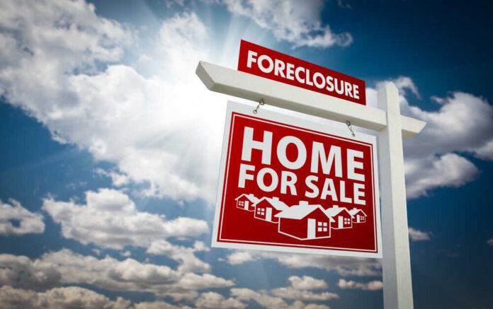 Red,Foreclosure,Home,For,Sale,Real,Estate,Sign,Over,Beautiful