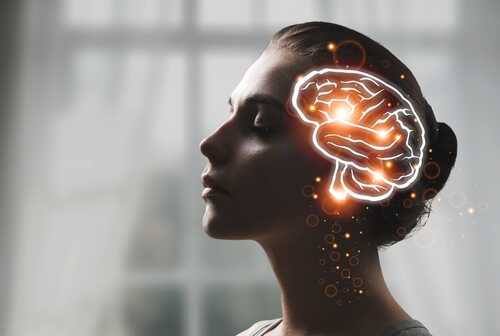 shutterstock_2525029183.jpg Profile silhouette of a woman with a glowing brain illustration
