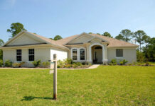 Rent-to-Own SHOCKER: Buyers Beware Hidden Costs! Large house with a for sale sign